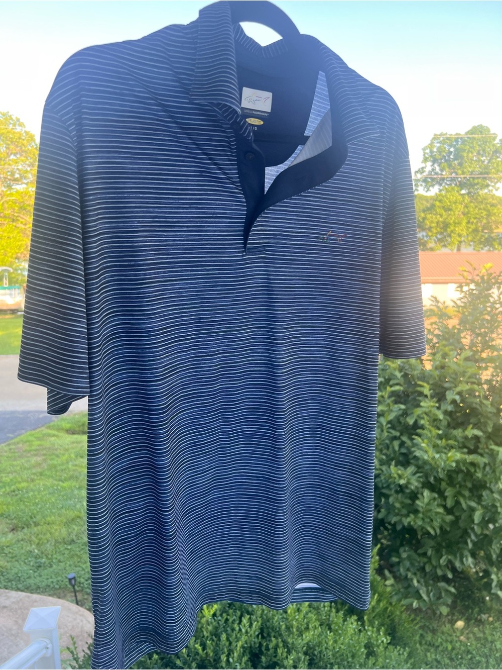 Greg Norman Collection Navy and White Striped Polo